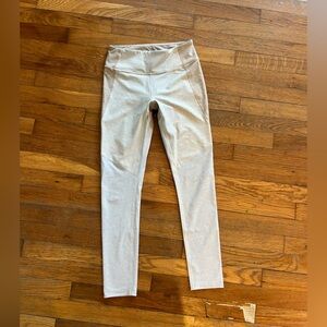 Tan and gray “Outdoor Voices” leggings
